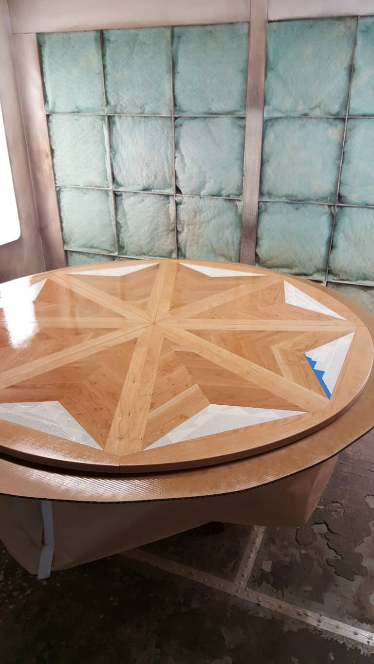 In progress Wood Finish 8 Leaf Expanding Round Table w/ Marble - Angelo